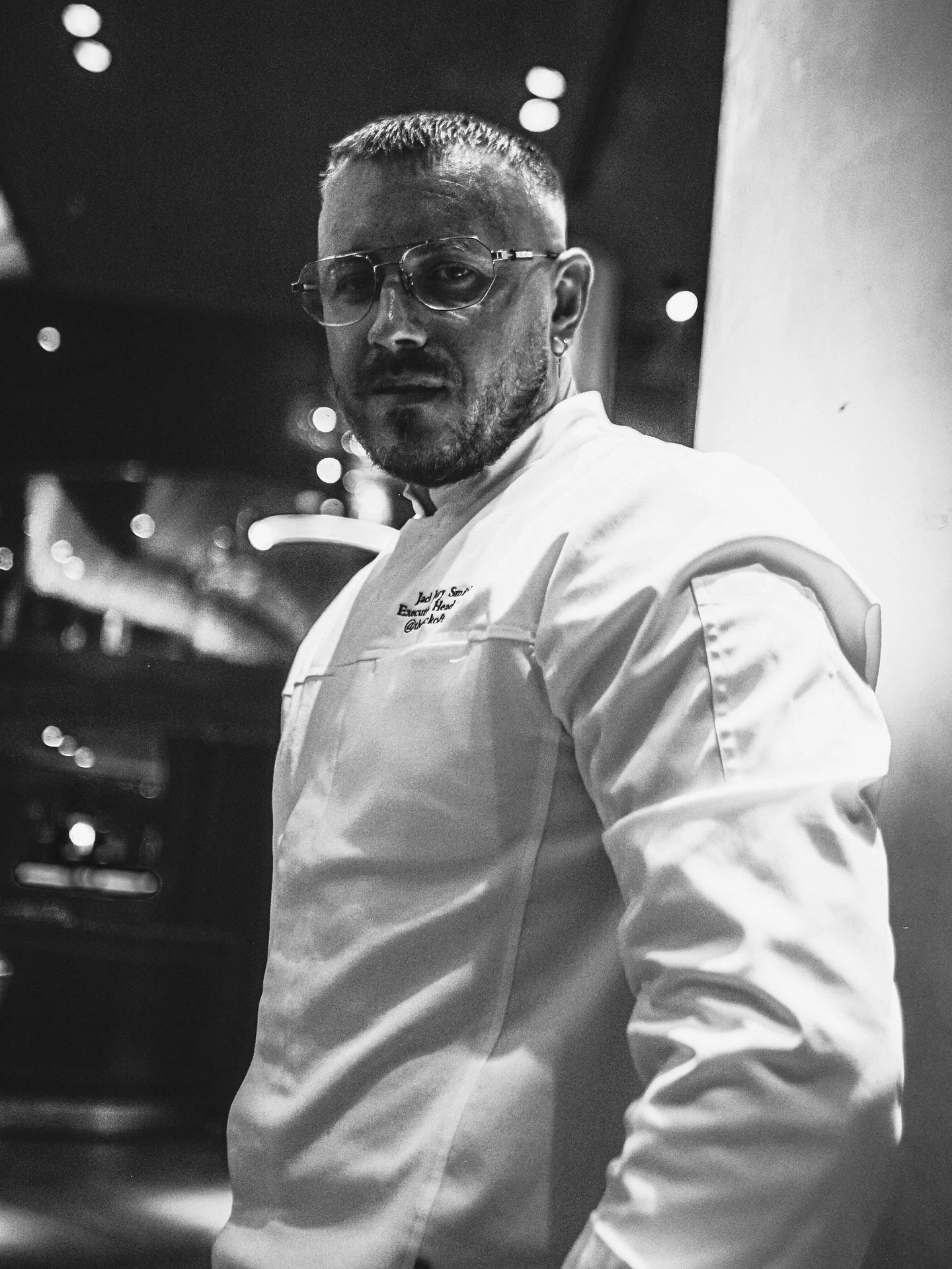 Black-and-white portrait of Jack Smith in chef whites